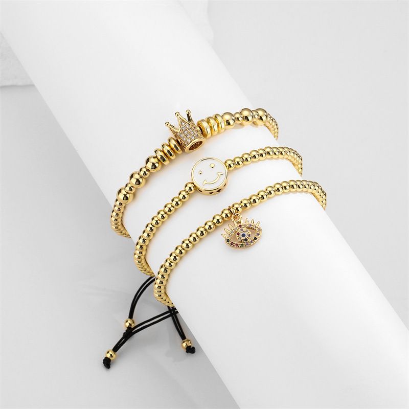 Kupfer einfache Stil Teufelsauge Krone Lächeln Gesicht Armbänder_voghion.com
