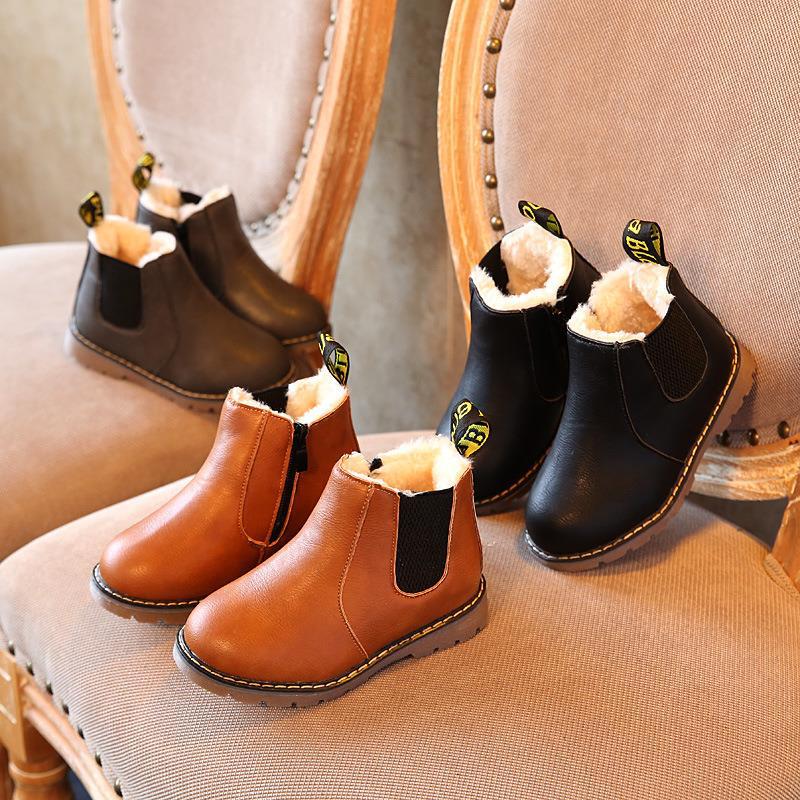 2023 Autunno e inverno nuove scarpe per bambini Stivali corti da ragazzo Stivali in pelle britannici Stivali singoli da ragazza Big Boy Martin