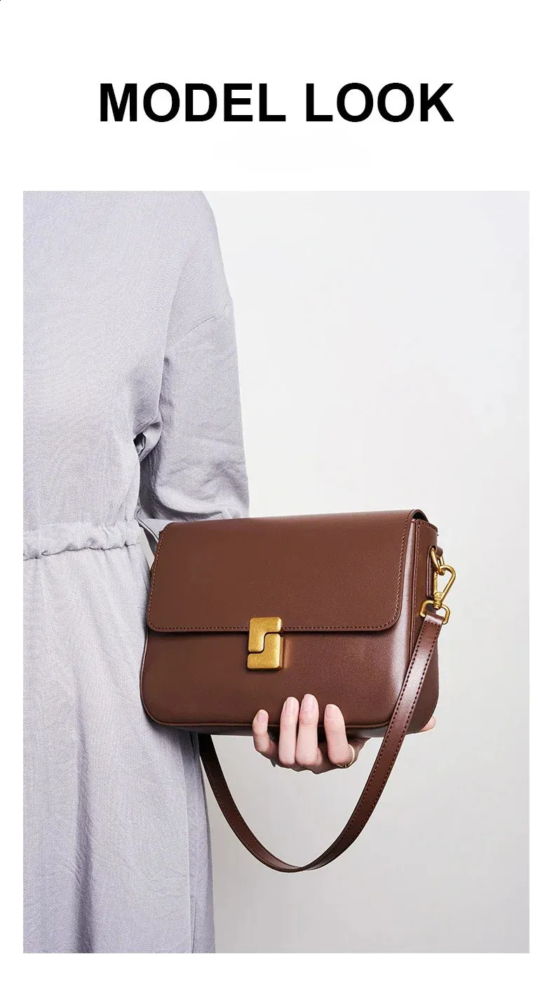 Crossbody- och axelremsväska i äkta läder med guldspänne för dam_voghion.com