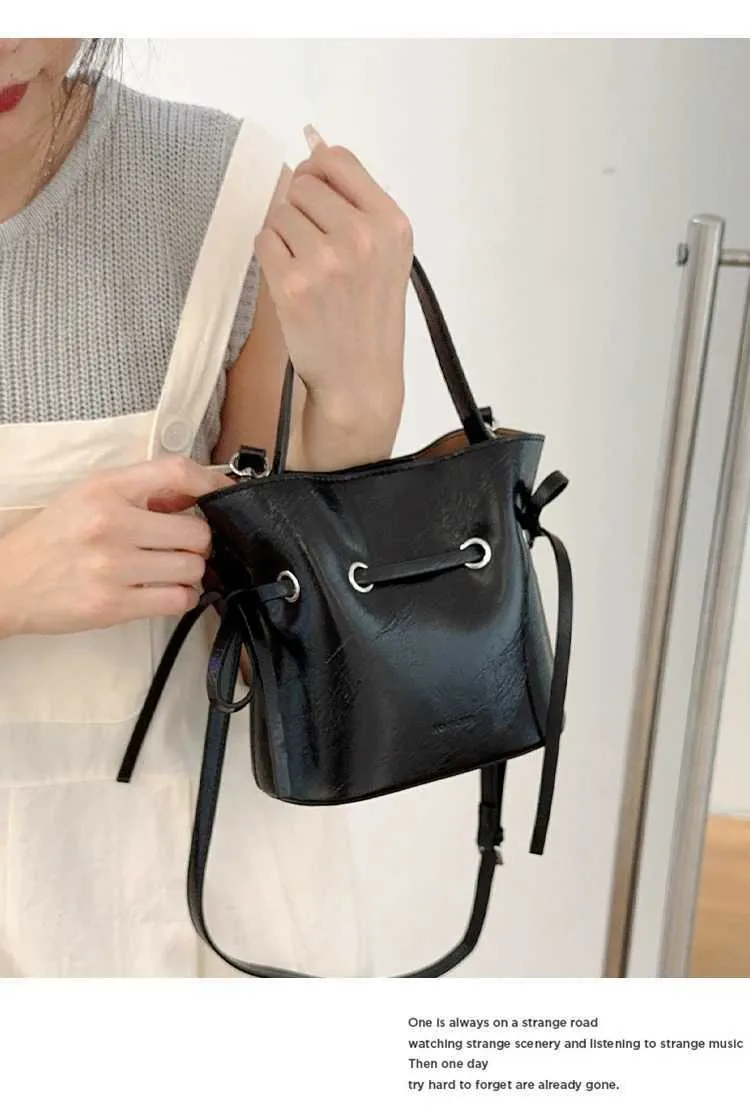 Borsa a secchiello vintage in ecopelle con fiocco borsa a tracolla_voghion.com