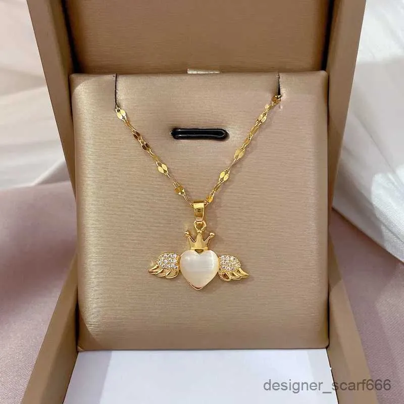 Collana girocollo con catena in acciaio inossidabile, ciondolo a forma di cuore con corona in stile gotico, colore oro, per donne_voghion.com