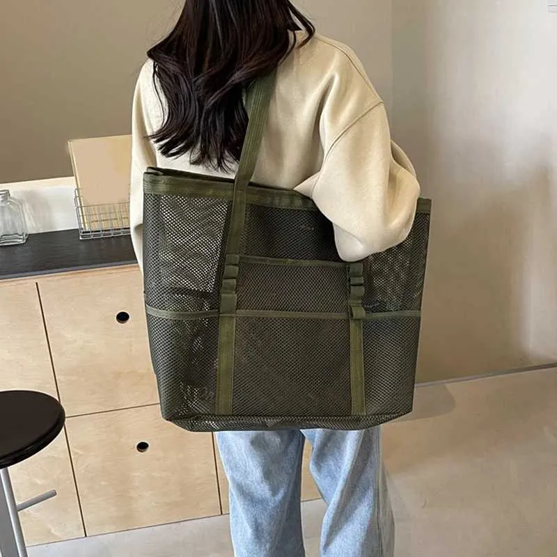 Hollow large capacity makeup storage womens multifunctional mesh shoulder travel transparent beach bag Y241011_voghion.com