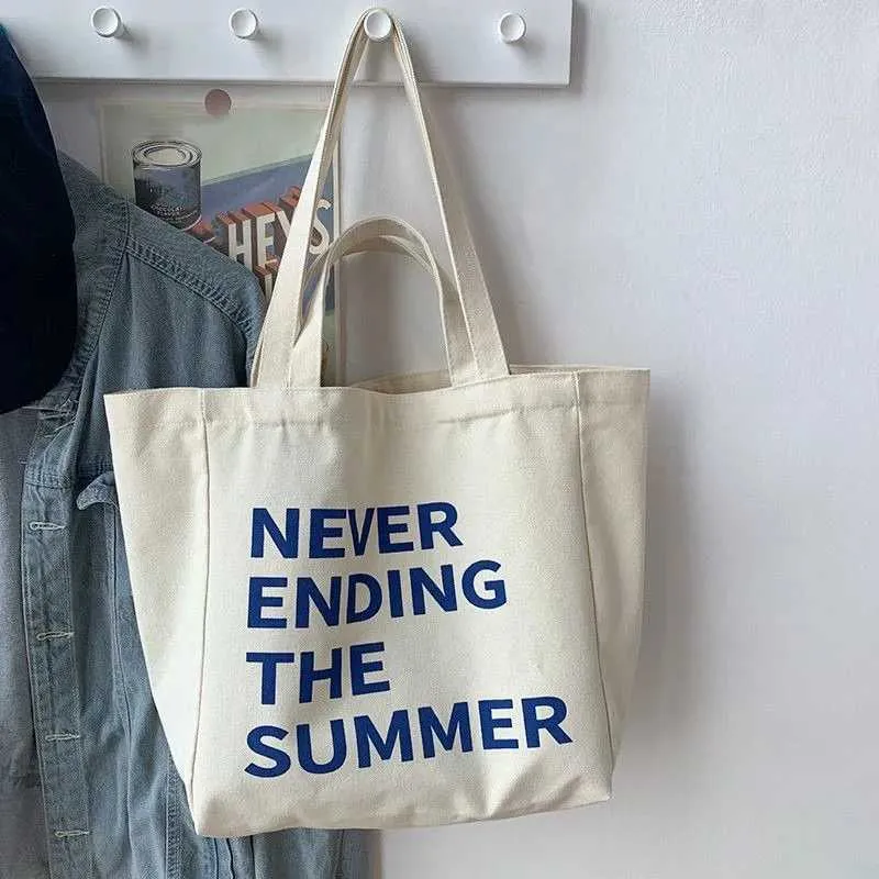 Large capacity retro letter printed canvas handbag with foldable design - perfect for casual shopping and daily use_voghion.com