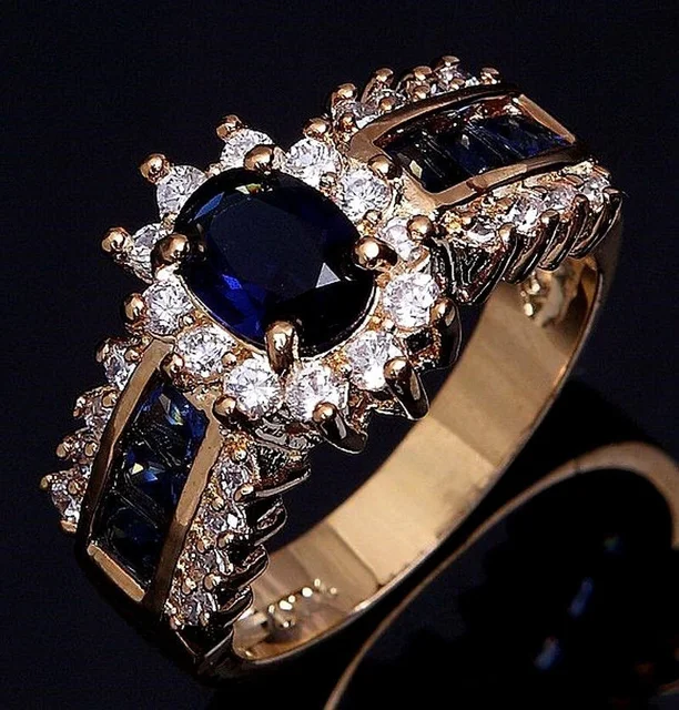 2025 Nieuwe aankomsten Luxe blauw rode zirkoon mode heren en dames gouden kleur jubileum unisex sieraden trouwringen groothandel_voghion.com