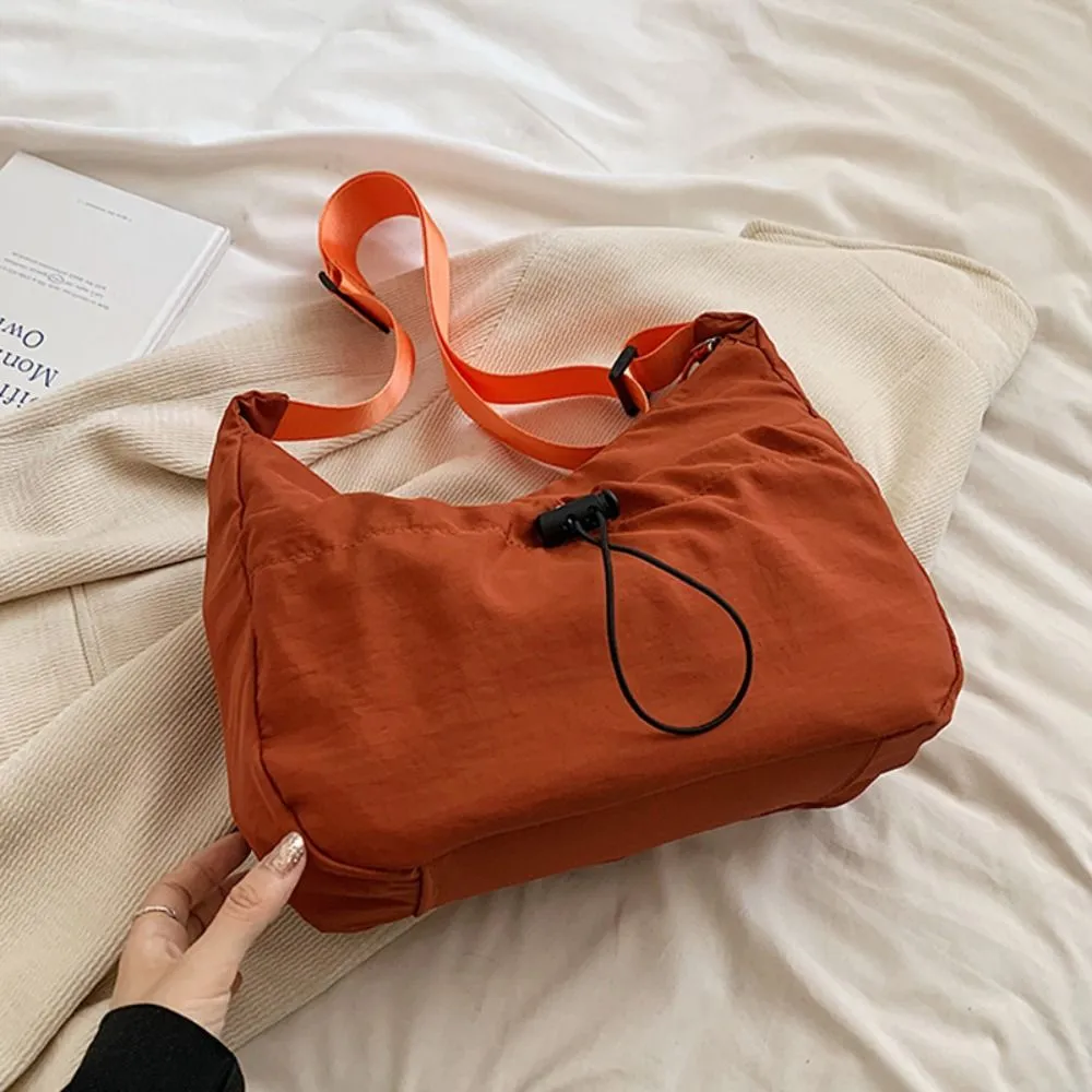 Borsa a tracolla in tela stile coreano con tracolla regolabile in nylon con coulisse e tracolla in tinta unita_voghion.com