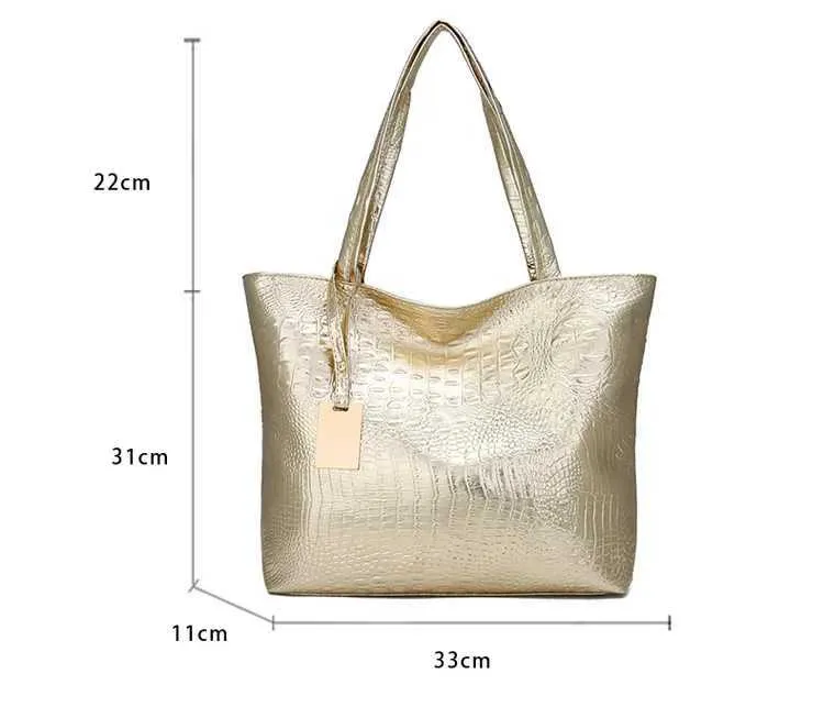 Designer schoudertas en tote bag voor dames in zwart en goud_voghion.com
