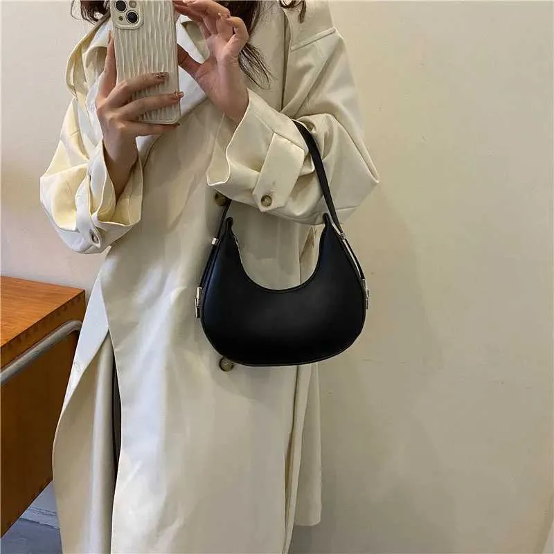 Borsa a spalla a mezzaluna donna elegante in ecopelle_voghion.com