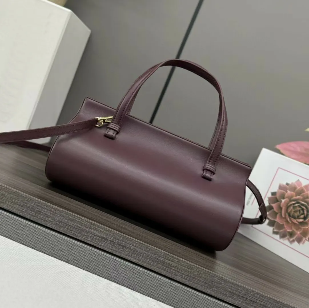 Elegante Tasche mit Henkel aus hochwertigem Leder – glattes Röhrendesign, goldfarbene Metallteile für den täglichen Gebrauch_voghion.com