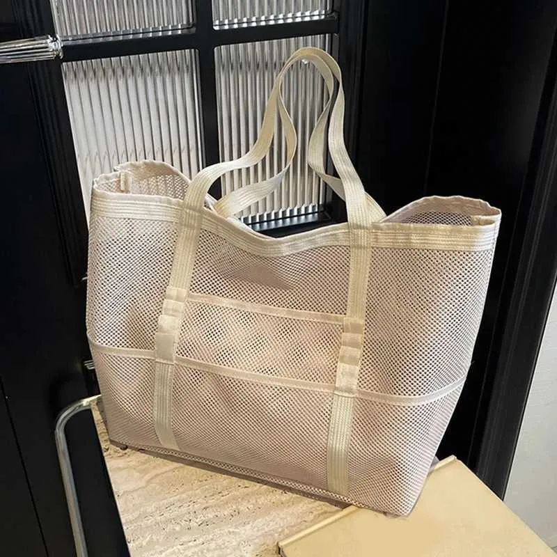 Hollow large capacity makeup storage womens multifunctional mesh shoulder travel transparent beach bag Y241011_voghion.com