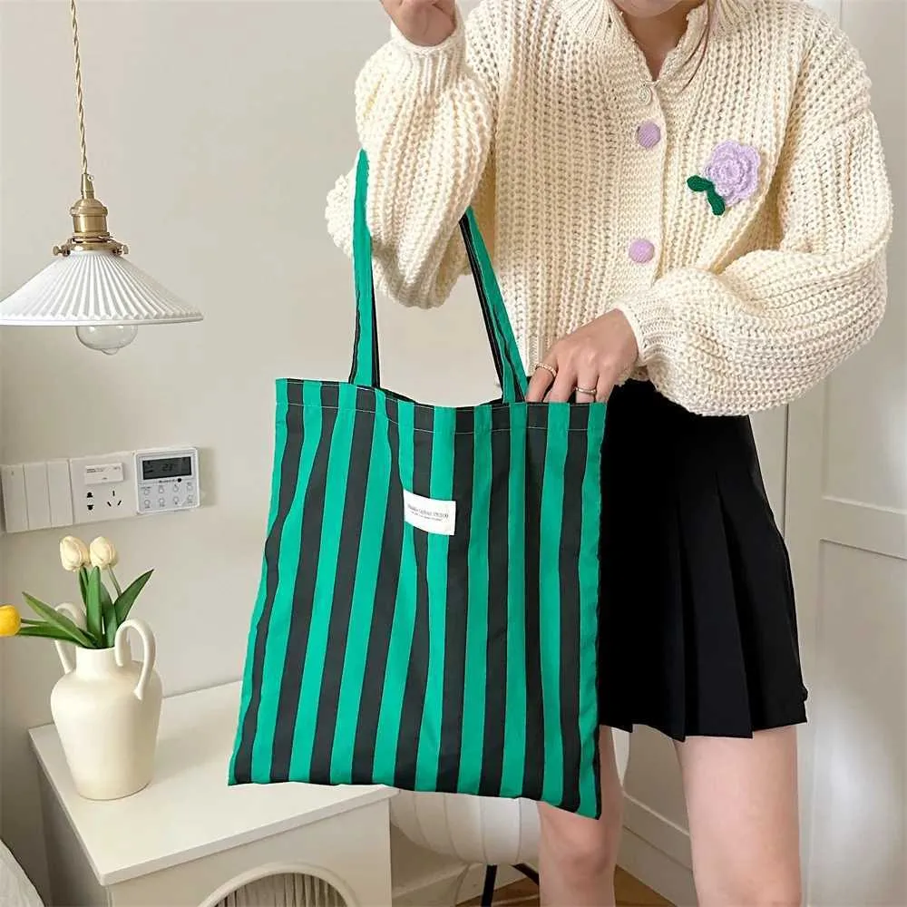 Vintage gestreifte warme Leinwand große Kapazität tägliche Einkaufstasche lässig tragbare Damen Reisehandtasche Y241109_voghion.com