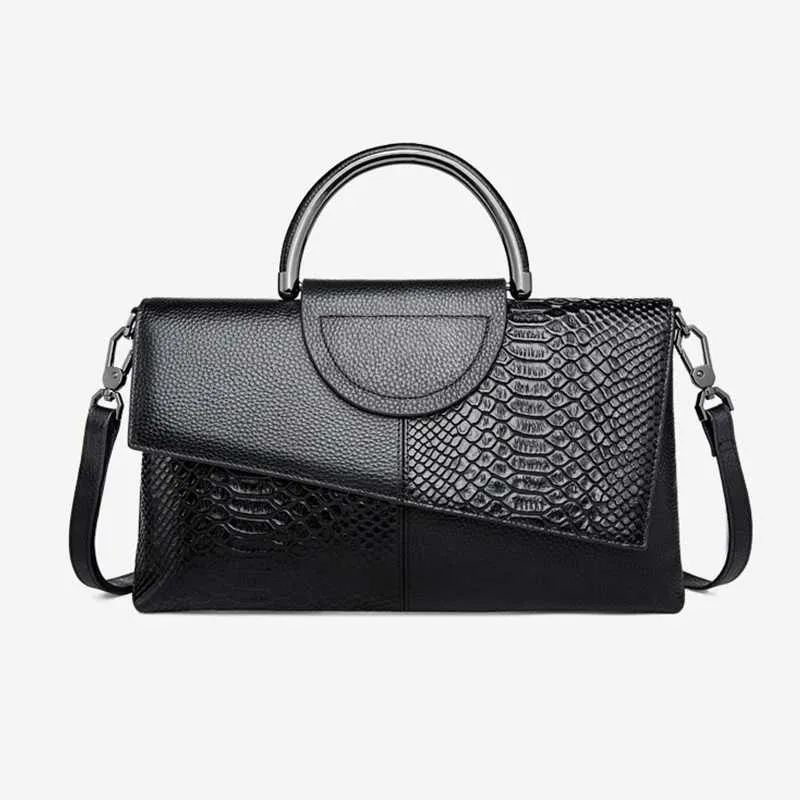Borsa a mano elegante da donna con stampa pitone e tracolla_voghion.com