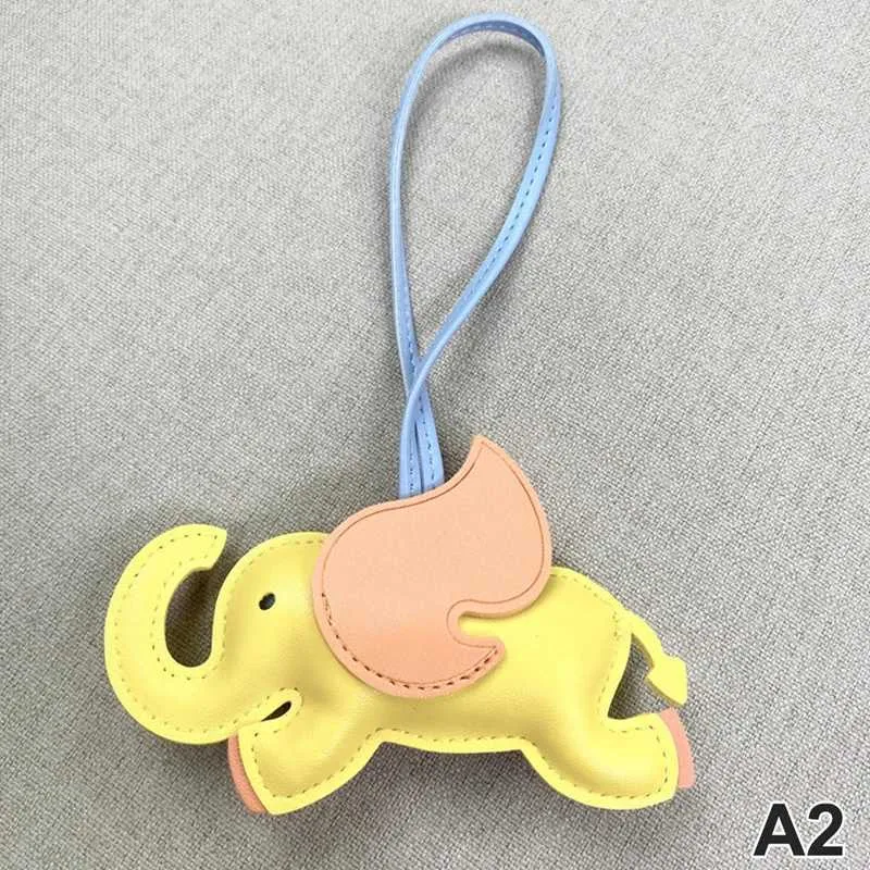 Designer de modă din piele PU aripi zburătoare elefant umeraș breloc pandantiv pentru femei accesorii pentru geantă de mână_voghion.com