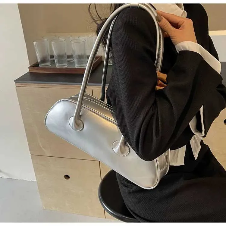 Sac à aisselles en bâton français de grande capacité, version coréenne, tendance féminine, Xiaohongshu, même style, bandoulière simple, porté à la main_voghion.com