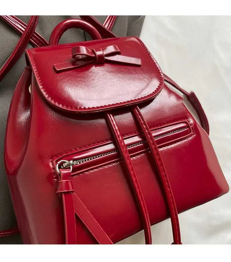 Mochila feminina sólida com aba e laços, mini bolsas de ombro, versátil, feminina, grande capacidade, bolsas de couro, casual, estudante_voghion.com