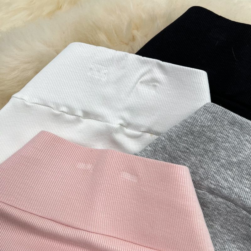 Gonna a sirena in maglia aderente con spacco sopra il ginocchio, a vita alta e lunghezza media, da donna_voghion.com