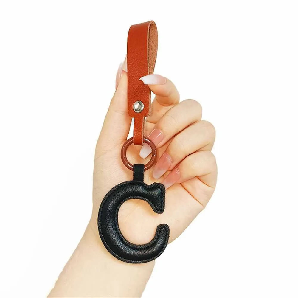 Creative leather English letter keychain pendant decoration phone bag accessories gift Y241121_voghion.com