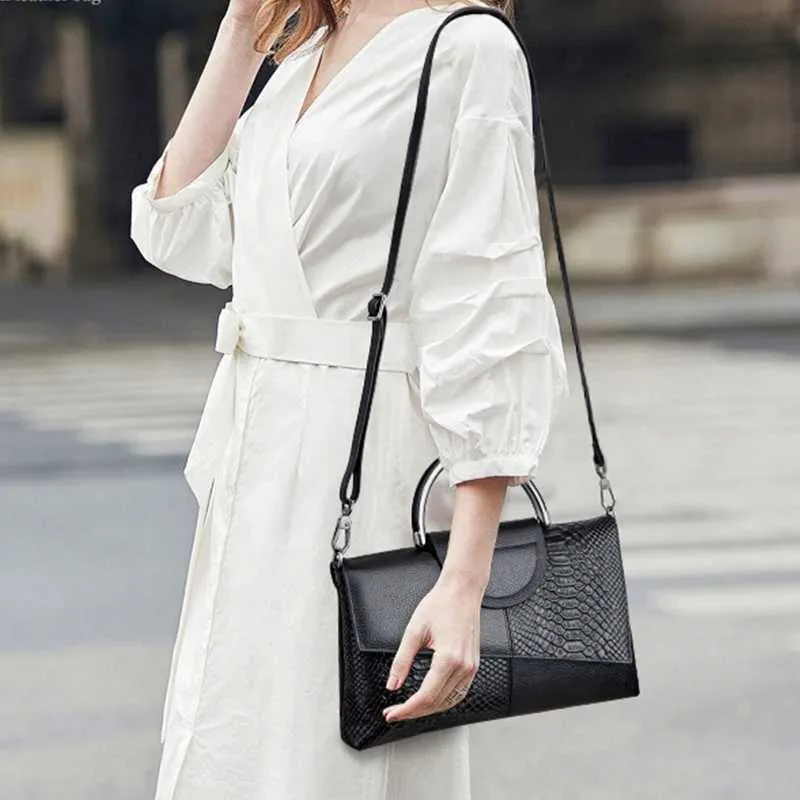 Borsa a mano elegante da donna con stampa pitone e tracolla_voghion.com