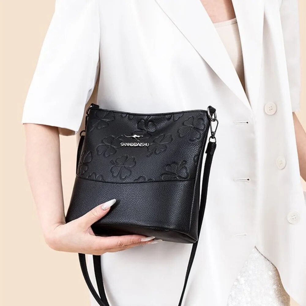 Leather handbag spring/summer 2024 new Joker shoulder messenger bag mother bag middle-aged handbag old soft leather backpack_voghion.com