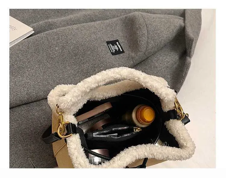 Borsa a secchiello vintage in scamosciato a contrasto tracolla_voghion.com