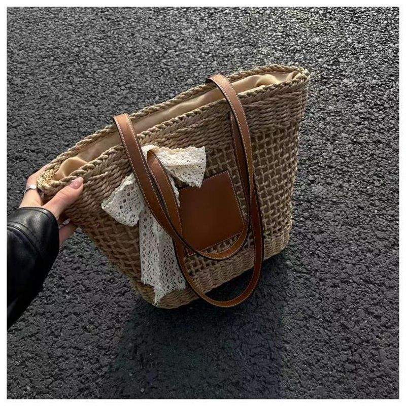 hollow shoulder new simple straw woven holiday style beach versatile women's bag_voghion.com