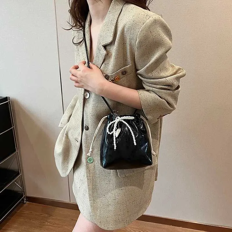 Sac à main bandoulière femme drawstring en similicuir élégant_voghion.com