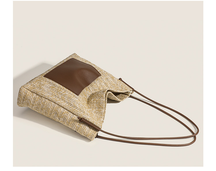Grass woven tote bag for spring versatile women with niche design, large capacity commuting, seaside vacation style_voghion.com