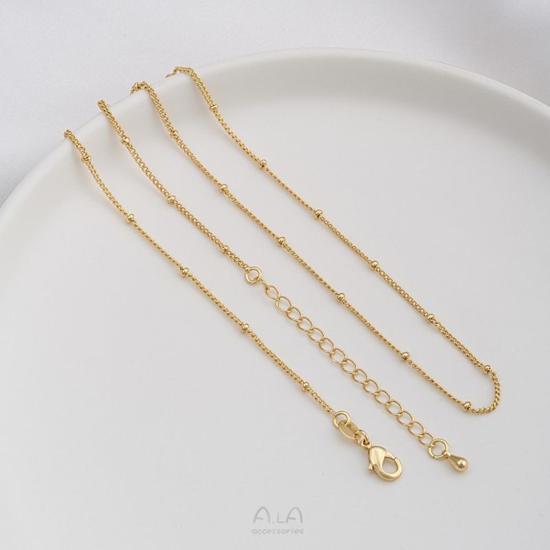 Catena di estensione a goccia d'acqua con perlina piatta O in acciaio JF14K con finitura in oro vero, colore preservato, clavicola da 45 cm_voghion.com