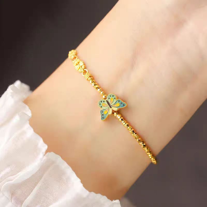 Prinsessan på flykten Bränd blå fjäril guldfärg blinkande laser trasigt Sier några få taels av disco pärlor armband_voghion.com