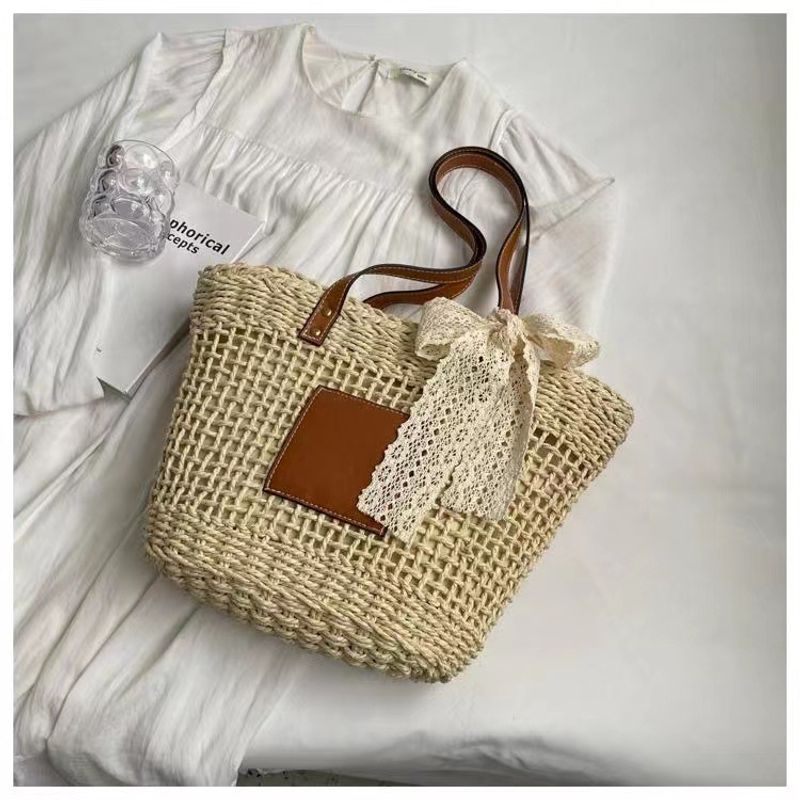 hollow shoulder new simple straw woven holiday style beach versatile women's bag_voghion.com