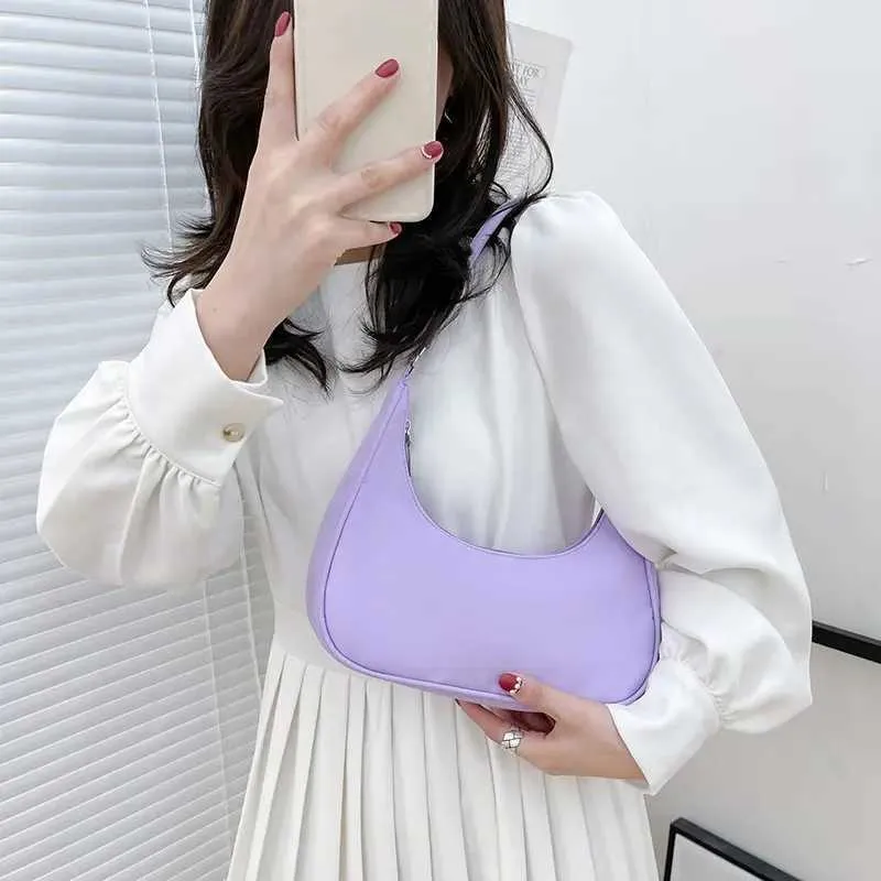 Wens Nyl Shoe 2023 Fi Solid Canvas Dumpg Unterarm Designer Tasche Cluh Geldbörse und Handtasche Y241026_voghion.com