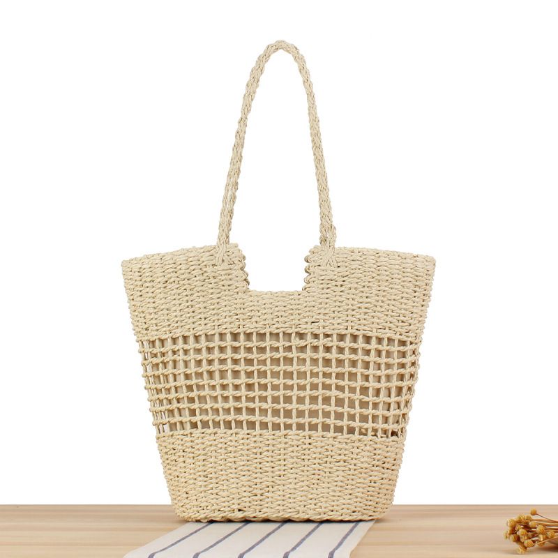 Gewebte Tasche aus Papierseil, neue französische Nischen-Hohlgewebetasche, eine Schulter, handgehaltene Strandtasche mit_voghion.com