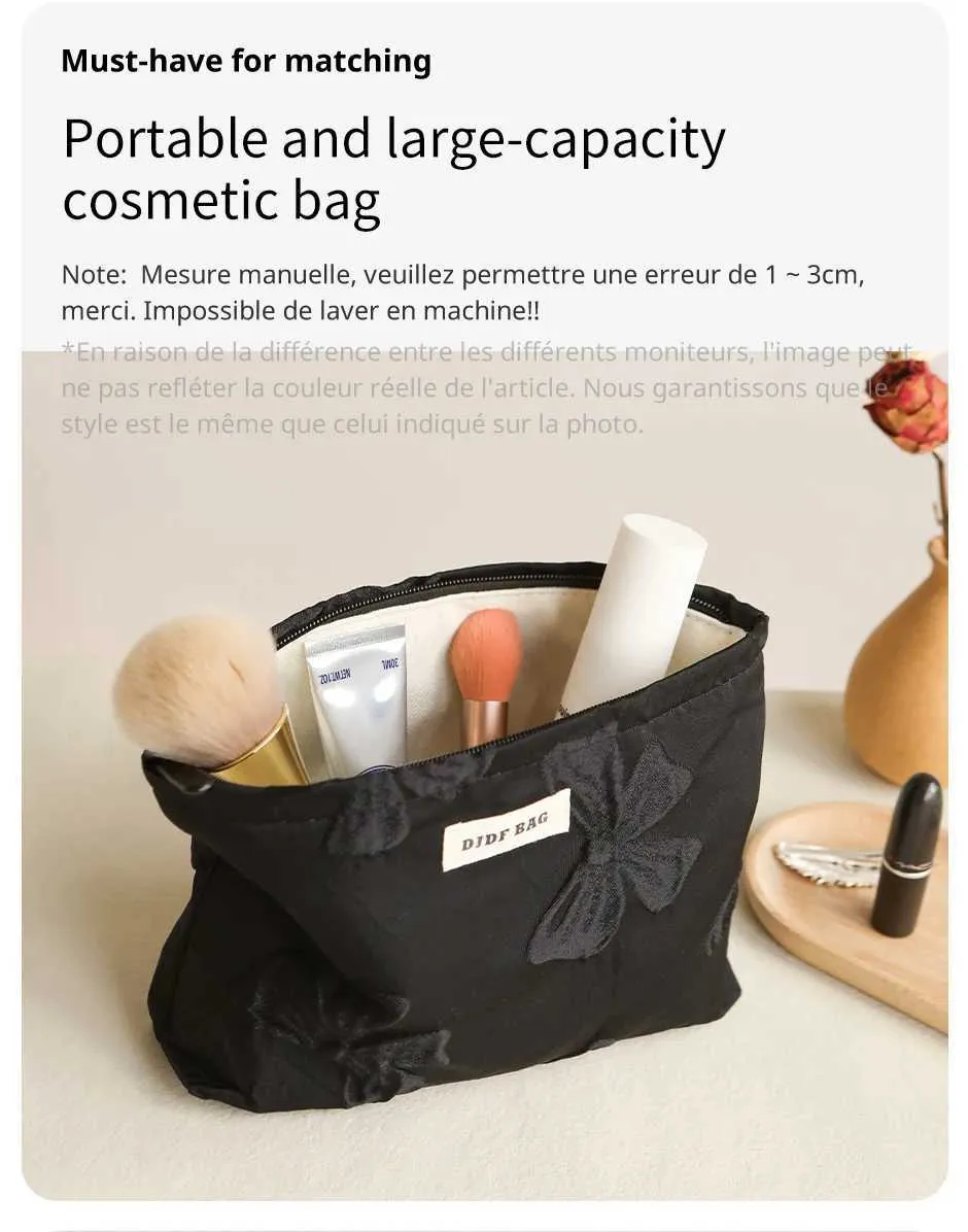 Pochette trucco nera con fiocco grande beauty case elegante_voghion.com