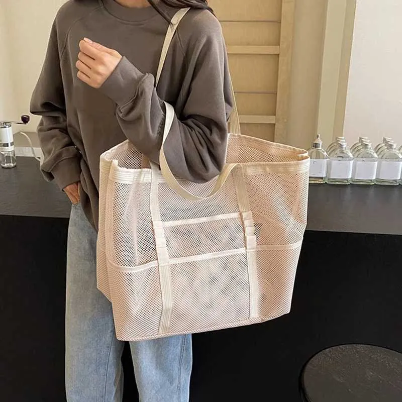 Hollow large capacity makeup storage womens multifunctional mesh shoulder travel transparent beach bag Y241011_voghion.com