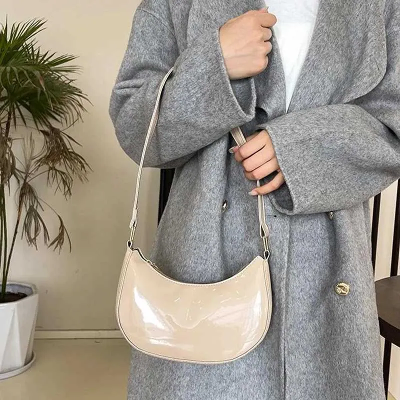 Designer Bag Fashionable new solid color bright textured light handheld zipper cross shaped bag Y241115_voghion.com