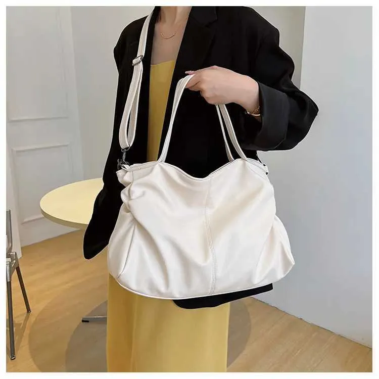 Large black shoulder large homeless shopping solid color high-quality leather cross body handbag womens travel bag_voghion.com