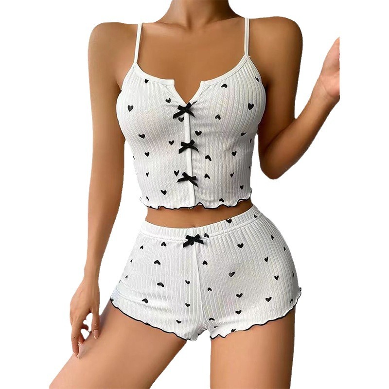 Sous-vêtements pour femmes Nouveaux produits en forme de cœur imprimé couleur contrastée Vêtements pour la maison Ensemble de pyjama à bretelles fendu sur le devant