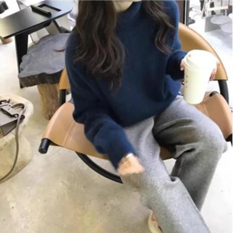 Pulls pour femmes Pull tricoté en cachemire pour femmes Élégant col haut Col roulé Lâche Épaissir Chaud Couleur unie_voghion.com