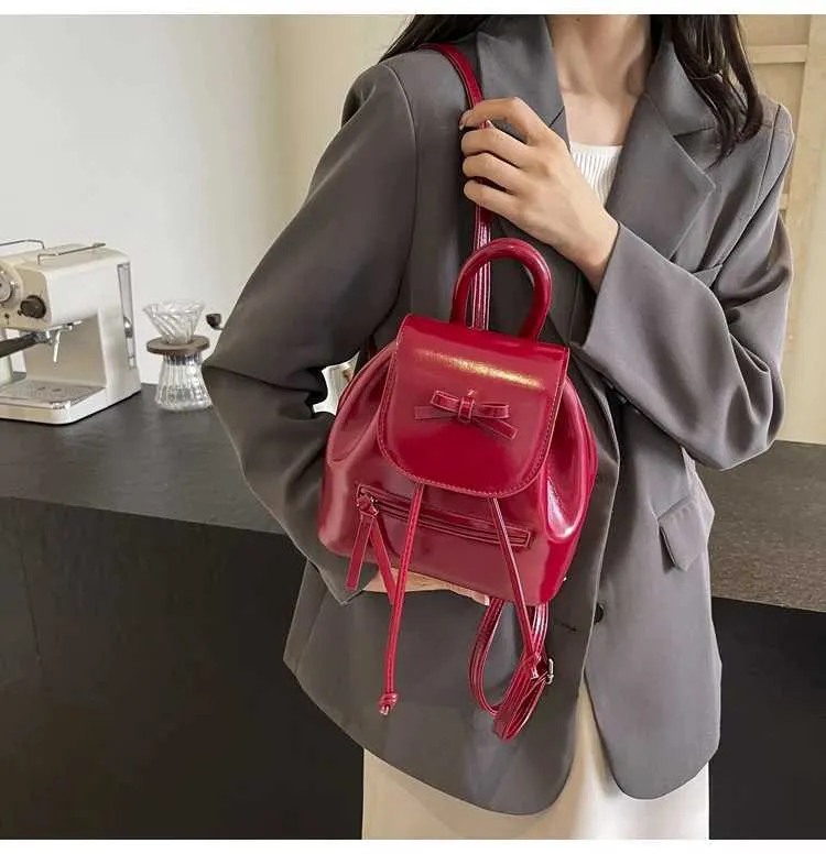 Mochila feminina sólida com aba e laços, mini bolsas de ombro, versátil, feminina, grande capacidade, bolsas de couro, casual, estudante_voghion.com