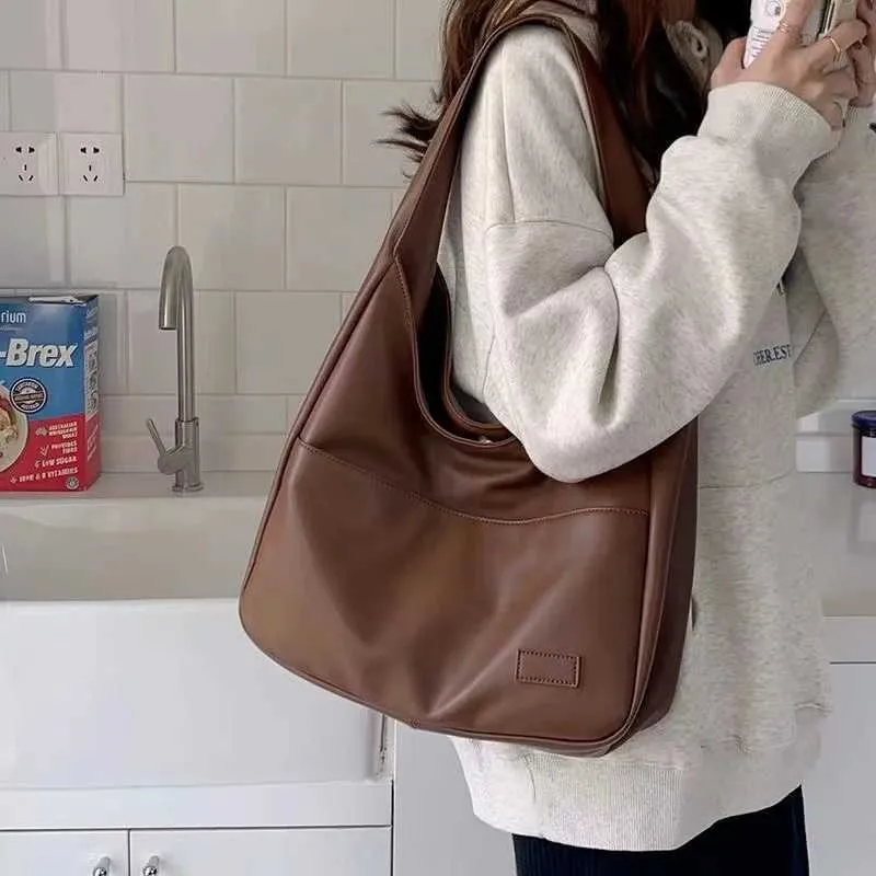 Large capacity new black leather simple casual womens handbag sturdy and durable shoulder bag Y241025_voghion.com