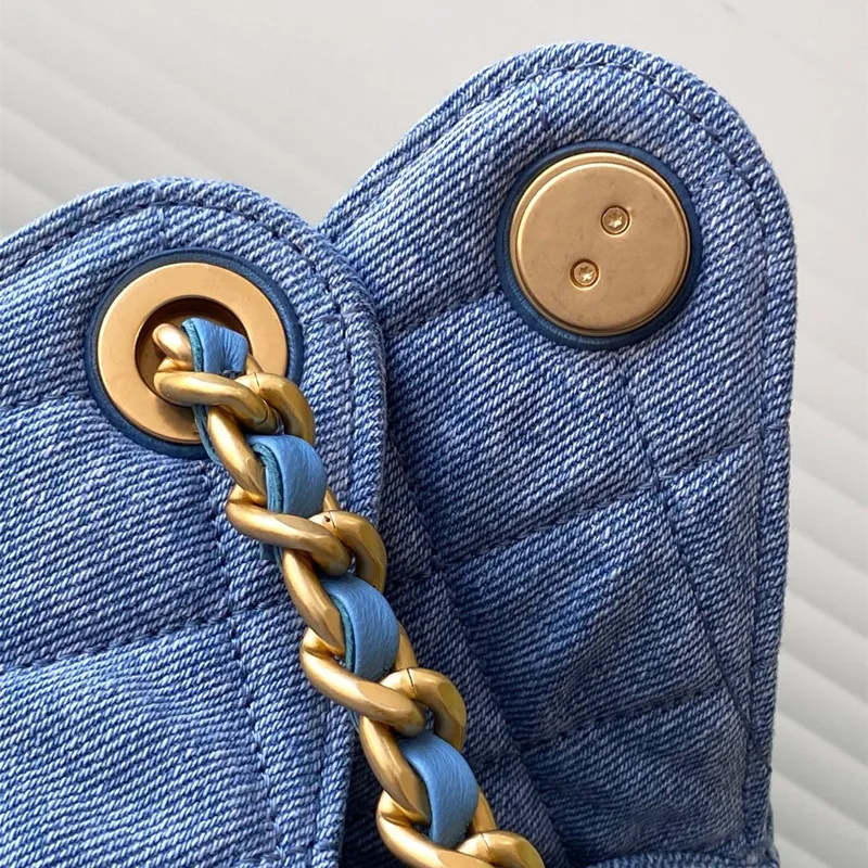 Borsa a secchiello con coulisse e tracolla a catena di alta qualità, 25 cm, in pelle Bury e denim blu, borse a mano, tote, moda_voghion.com