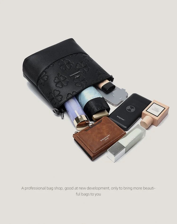 Leather handbag spring/summer 2024 new Joker shoulder messenger bag mother bag middle-aged handbag old soft leather backpack_voghion.com