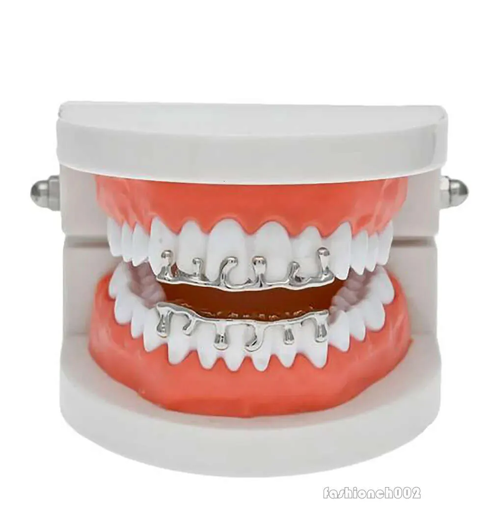 Mode Hip Hop Lava Grillzs vergoldet oben und unten Vampirzähne Grillz Rock Punk Rapper Zubehör mit 2 Silikon_voghion.com