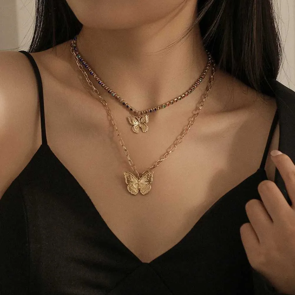 Colliers pendentifs rétro papillon doré en acier inoxydable avec chaîne serpent et breloque tendance pour femmes_voghion.com
