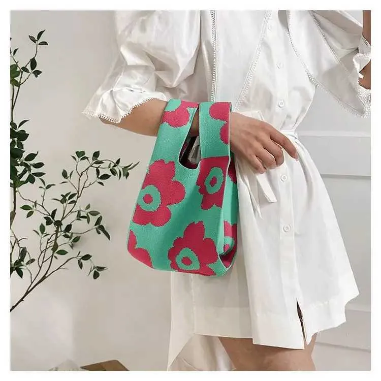 Borsa a mano in tela artistica giapponese di grande capacità, modello Geely, portafoglio con nodo casual e borsa da polso alla moda e versatile Wens_voghion.com