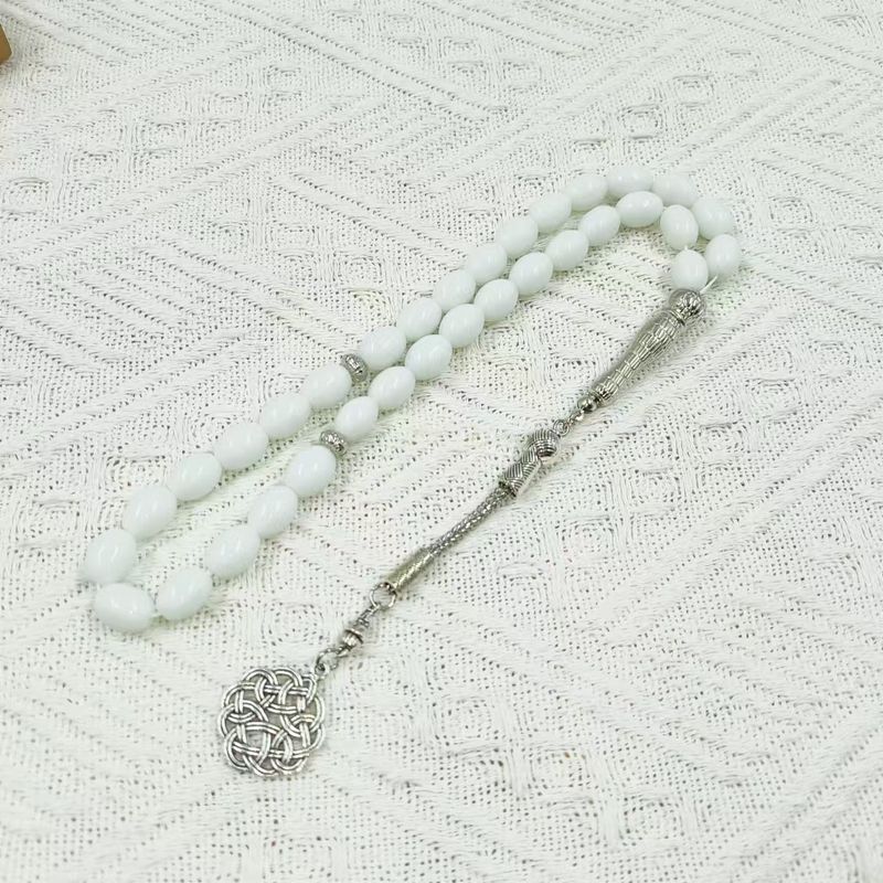 Braccialetto rosario unisex con 33 perle di riso e 8 cristalli_voghion.com