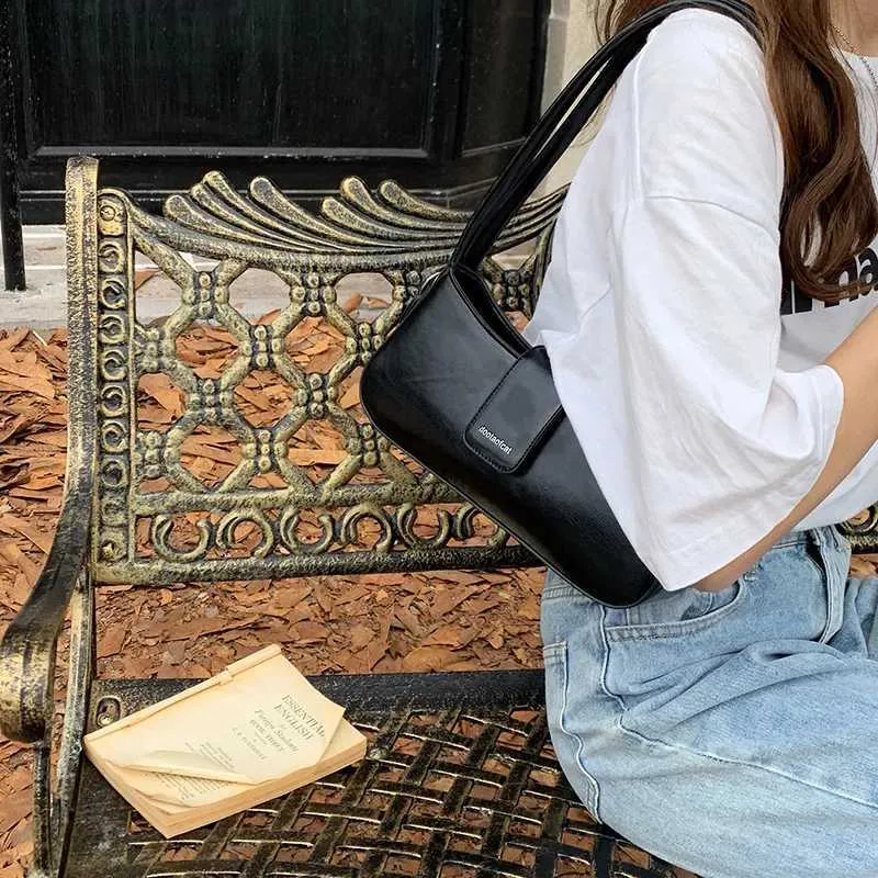 Fashion Shoulder Axillary Solid Color Niche Black Small Square Bag Leisure Versatile Lady Commuter Bags Crossbody_voghion.com