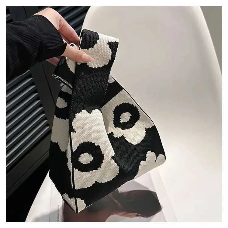 Borsa a mano in tela artistica giapponese di grande capacità, modello Geely, portafoglio con nodo casual e borsa da polso alla moda e versatile Wens_voghion.com