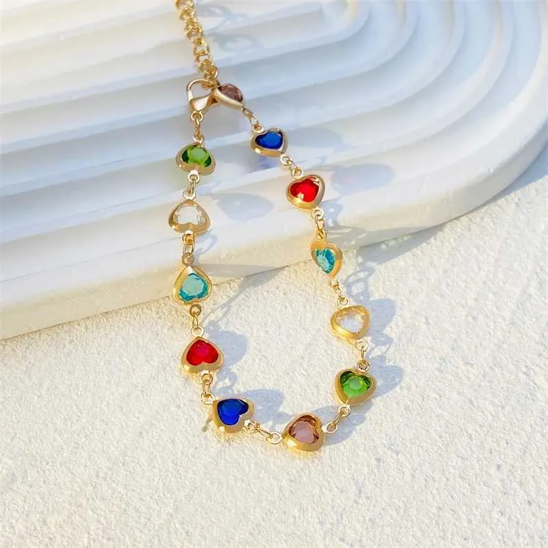 Bracciale tennis con cuore in zircone colorato e perle retrò_voghion.com