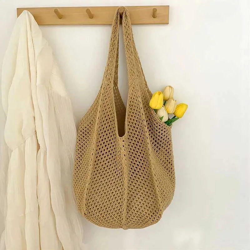Womens crochet handbag mesh beach large capacity fashionable knitted shoulder solid color simple shopping bag Y241011_voghion.com