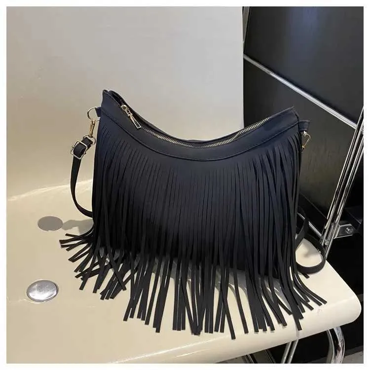 Sacs à bandoulière à pompons vintage pour femmes, grande capacité, sac à bandoulière décontracté à franges pour les voyages en plein air pour dames_voghion.com